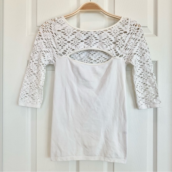 NWOT Bebe White Seamless Keyhole Cut-Out Holes Long Quarter Sleeves Top - Picture 1 of 7